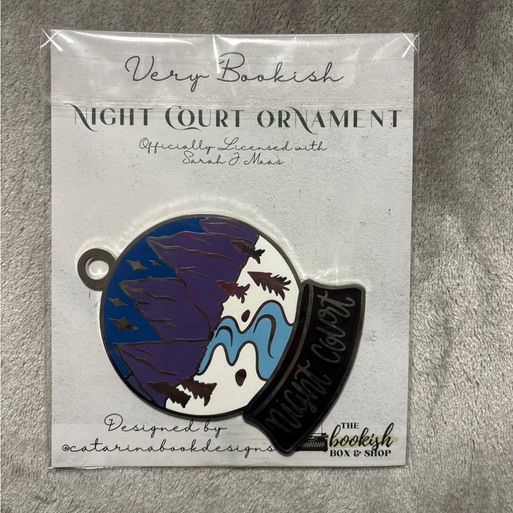 The Bookish Box Night Court Ornament with Purple and Black Design